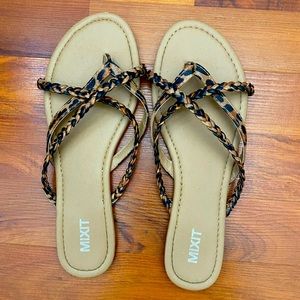 Cheetah printed sandals.